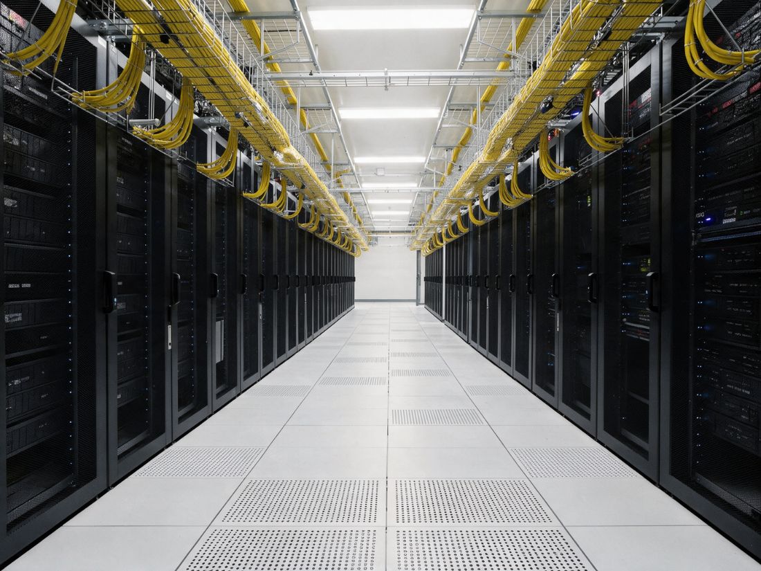Overhead fibre trays above server racks